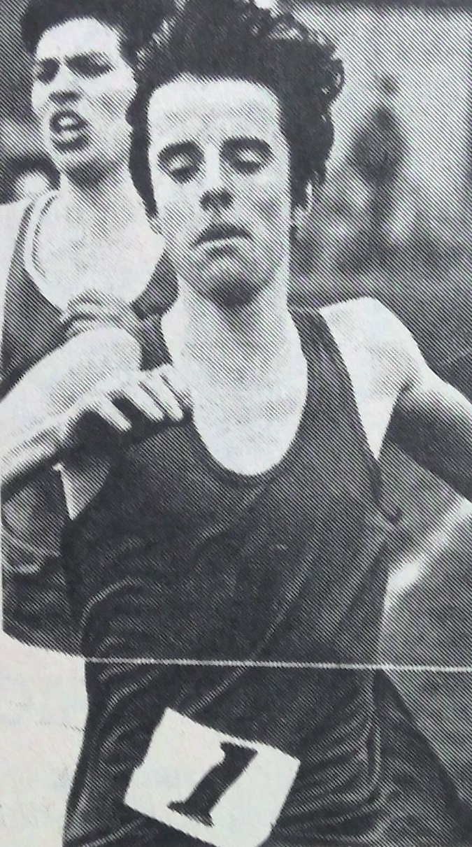 Johnny Jones breaks the tape