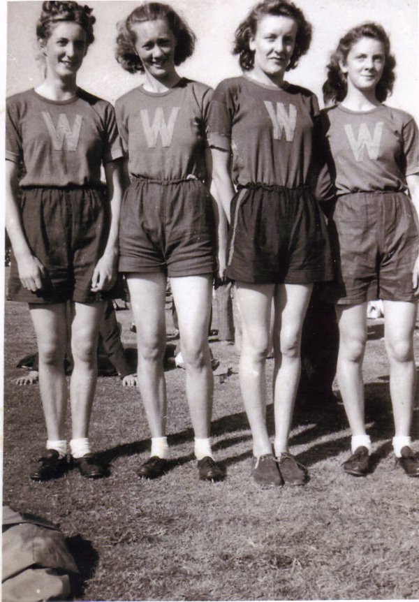 Penny Price, Brenda Humphrey, Beryl Hallam and Mary Currie Summer 1949 forming to 4 x 440 yd relay team.
Photo was published in the Wallasey News on 03/09/1949