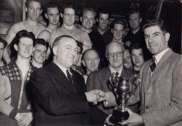 Len Platt receives Blair Trophy from Mr S. Lubbock chairman of L&D Committee  May1953