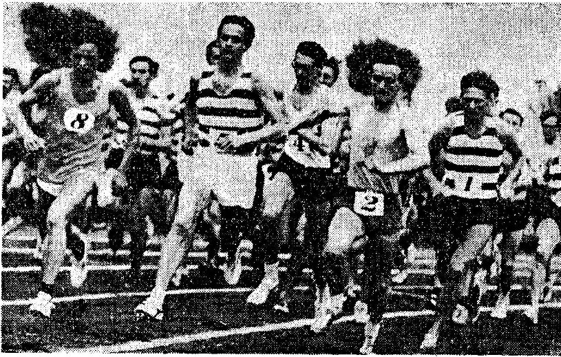 Runners round a bend in the 2 mile race at an athletics meeting at Wavertree