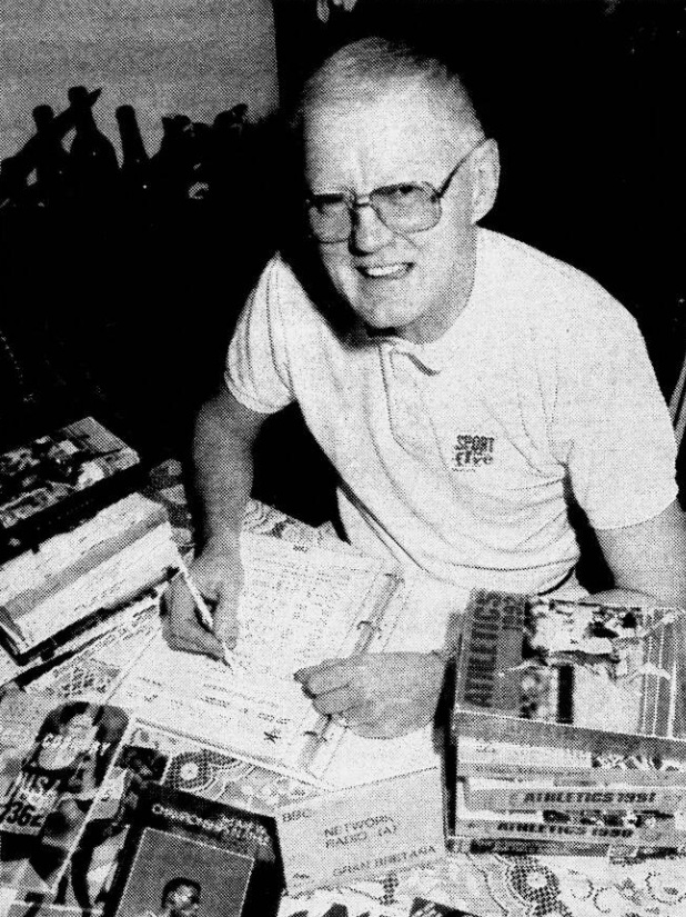 Bob Phillips with some of the facts and figures he uses for his athletics commentaries. Photo credit Eileen Kelly