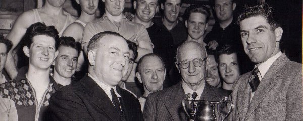 Len Platt receives Blair Trophy from Mr S. Lubbock chairman of L&D Committee  May1953