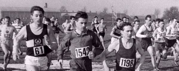 Number 1542 John Wright (Wallasey A.C.) competing in the National Cross Country Championships held at Cambridge on Saturday, March 2nd 1963. Also in the picture are number 61, A. Black (Belgrave Harriers) and number 1198, M. Jackson (Rotherham Harriers and A.C.)