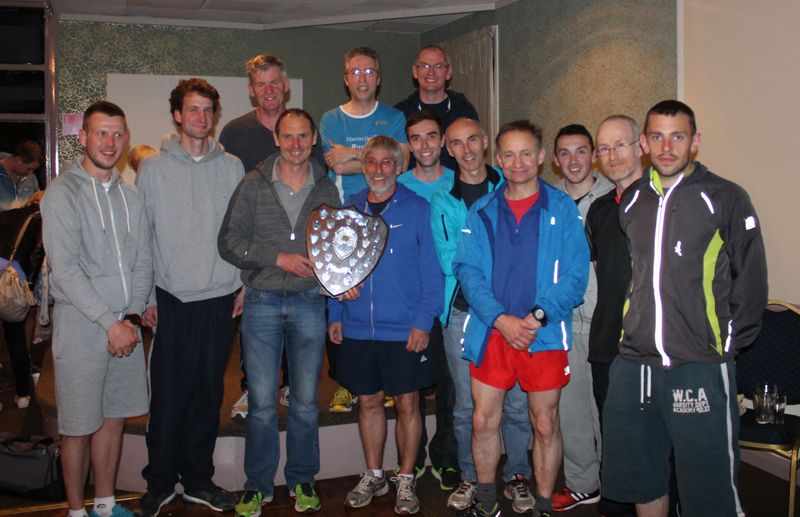 Men's team with the Division 1 Trophy